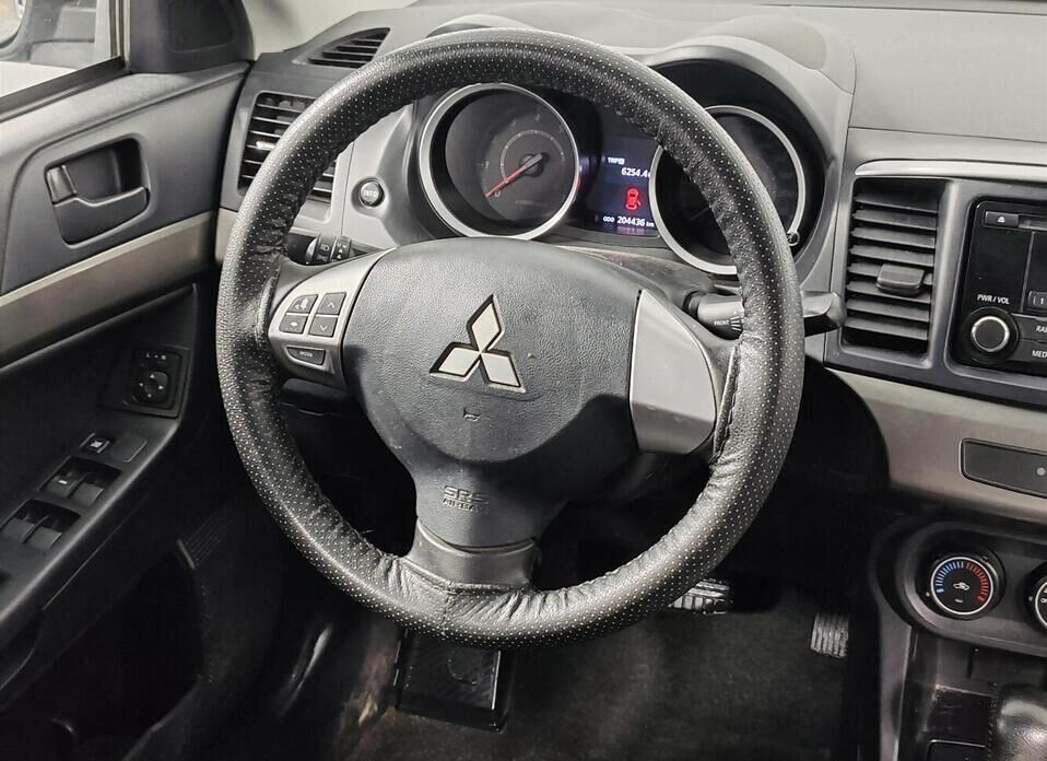 Mitsubishi Lancer, X Рестайлинг 1.6 AT (117 л.с.)
