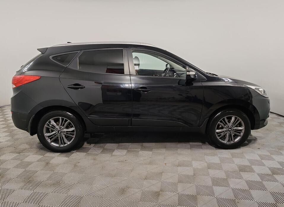 Hyundai ix35, I Рестайлинг 2.0 AT (150 л.с.) 4WD