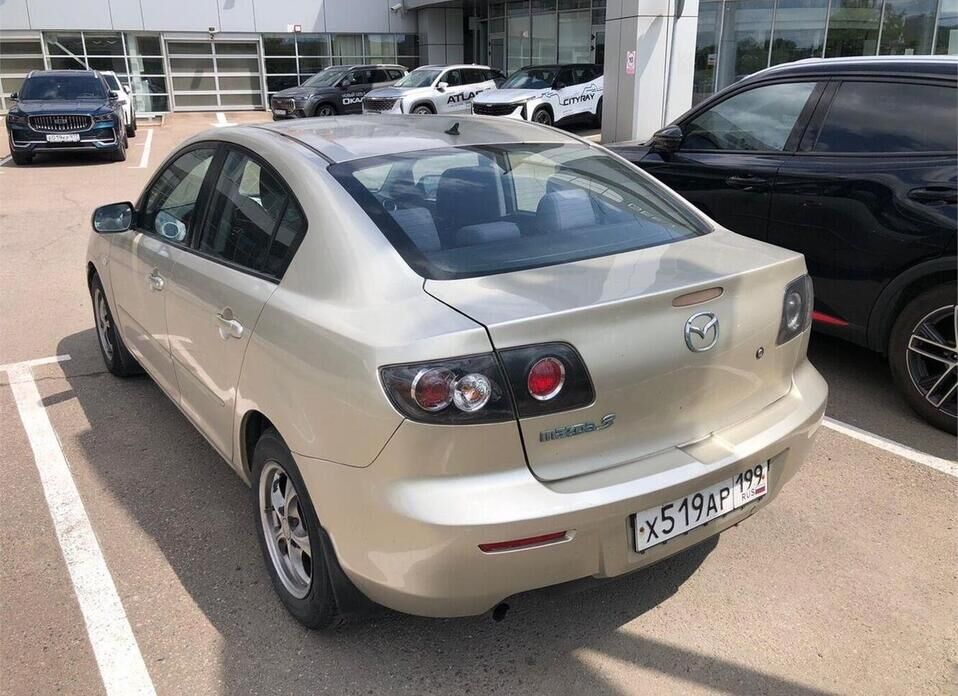 Mazda 3 1.6 AT (105 л.с.)