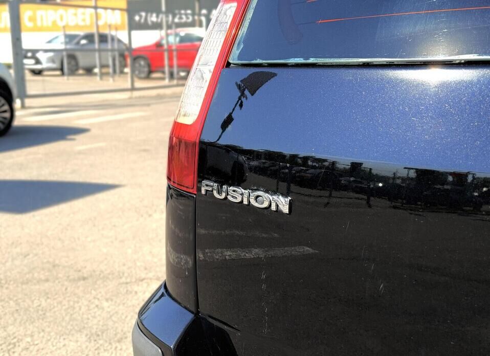 Ford Fusion, I Рестайлинг 1.4 MT (80 л.с.)
