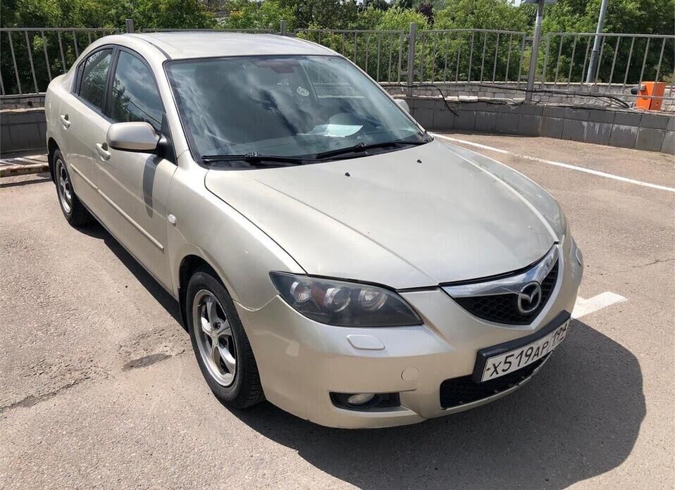 Mazda 3 1.6 AT (105 л.с.)