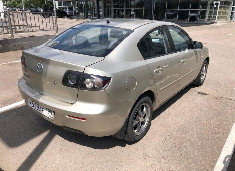 Mazda 3 1.6 AT (105 л.с.)