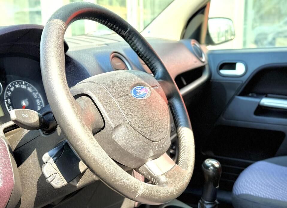 Ford Fusion, I Рестайлинг 1.4 MT (80 л.с.)
