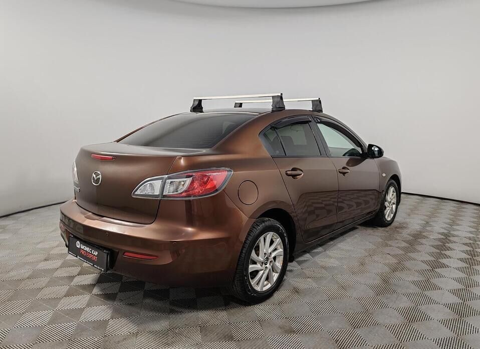 Mazda 3, II (BL) Рестайлинг 1.6 AT (105 л.с.)