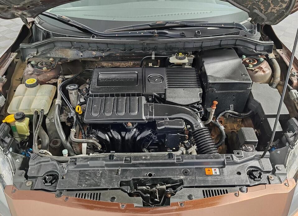 Mazda 3, II (BL) Рестайлинг 1.6 AT (105 л.с.)