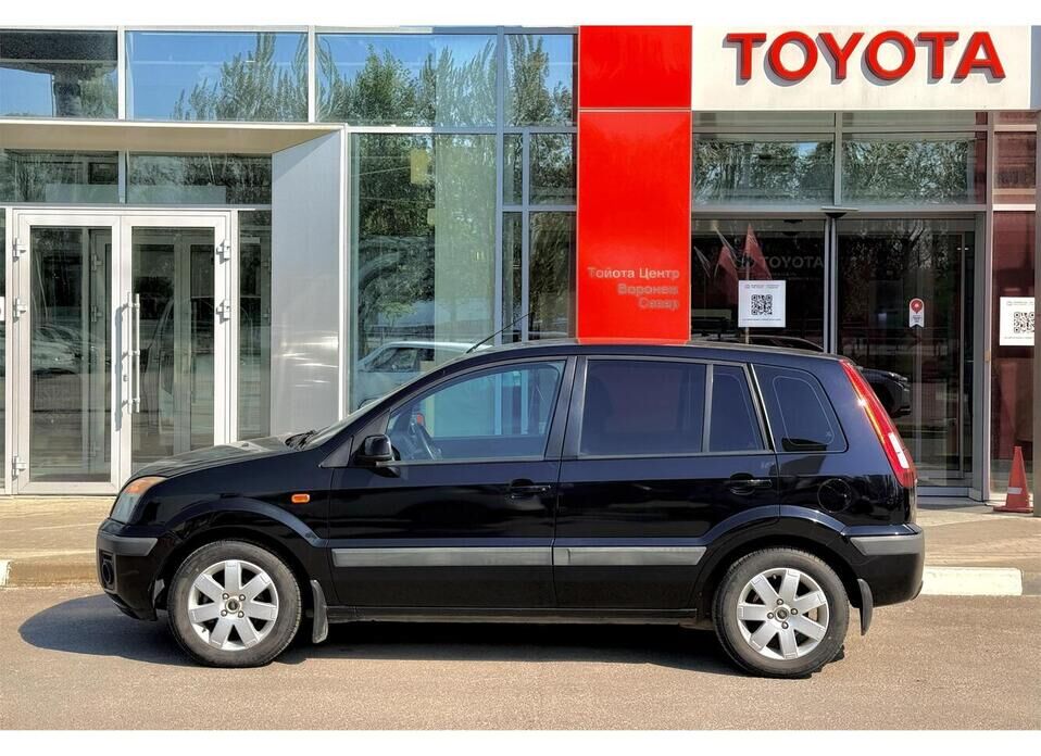 Ford Fusion, I Рестайлинг 1.4 MT (80 л.с.)