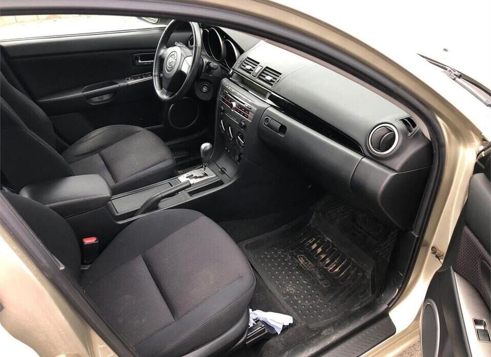 Mazda 3 1.6 AT (105 л.с.)