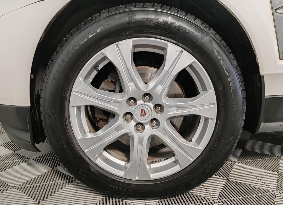 Cadillac SRX, II 3.0 AT (269 л.с.) 4WD