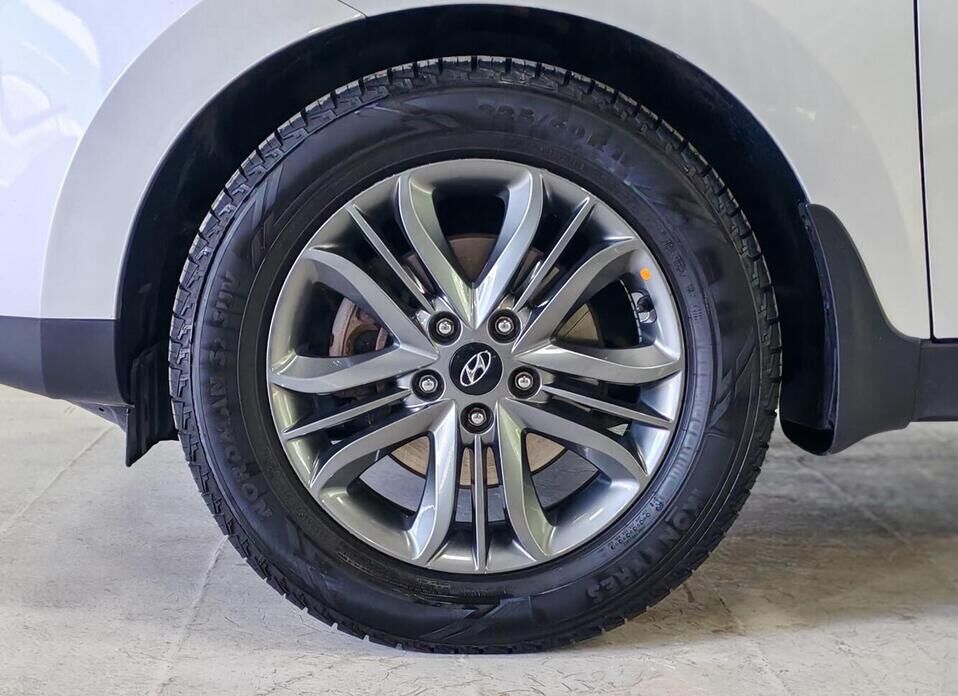 Hyundai ix35, I Рестайлинг 2.0 AT (150 л.с.)