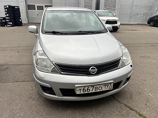 Nissan Tiida, 2010 г., 216 634 км